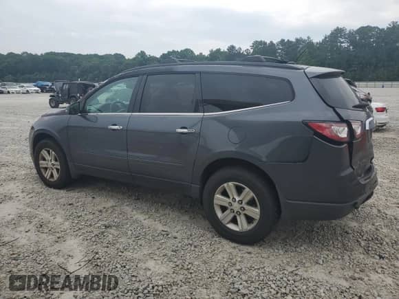 2014 Chevrolet Traverse LT с VIN 1GNKRHKD2EJ312603, выставлен на аукционе Copart как лот 59562055 с пробегом 188 595 миль миль и На запчасти • Non repairable. История ставок и продаж доступна на DreamBid. Изображение 2.