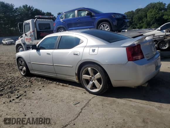 2007 Dodge Charger SRT-8 с VIN 2B3LA73W37H668188, выставлен на аукционе Copart как лот 68350674 с пробегом 150 769 миль миль и Списание • Salvage title. История ставок и продаж доступна на DreamBid. Изображение 2.