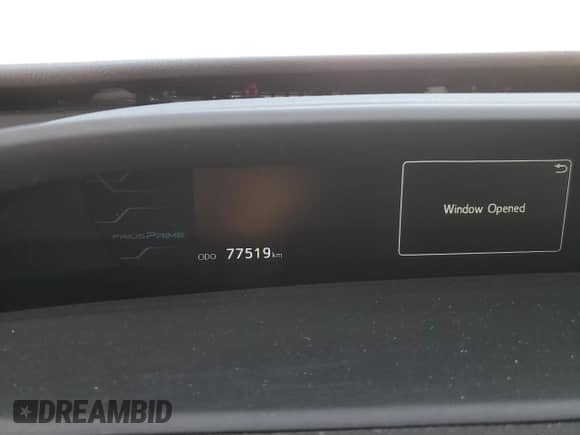 2018 Toyota Prius Plus z VIN JTDKARFP0J3079152, wystawiony jako Copart lot #80650285 z przebiegiem 77 519 mil mil oraz Szkoda całkowita • Salvage title. Historia ofert i sprzedaży dostępna na DreamBid. Obrazek 9.