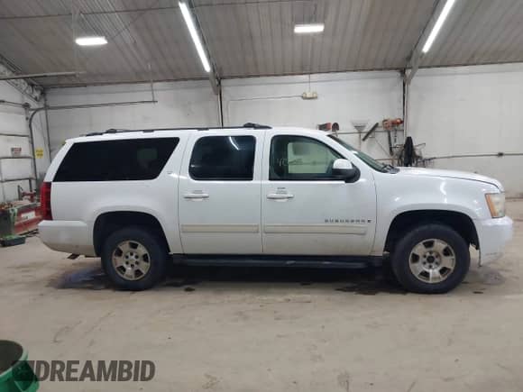 2009 Chevrolet Suburban 2LT with VIN 1GNFK26389R267808, listed as a IAAI auction lot 42860137 with 224,180 mi miles and . Bid and sale history available at DreamBid. Image 13.