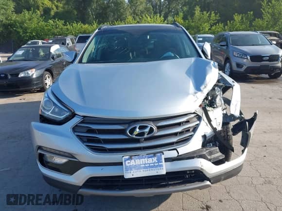 2017 Hyundai Santa Fe 2.4L with VIN 5XYZUDLB6HG491163, listed as a IAAI auction lot 42729584 with 91,606 mi miles and . Bid and sale history available at DreamBid. Image 12.