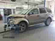 2005 Dodge Durango Limited with VIN 1D4HB58D75F583305, listed as a Copart auction lot 67010945 with 197,255 mi miles and Salvage title. Bid and sale history available at DreamBid. Image 1.