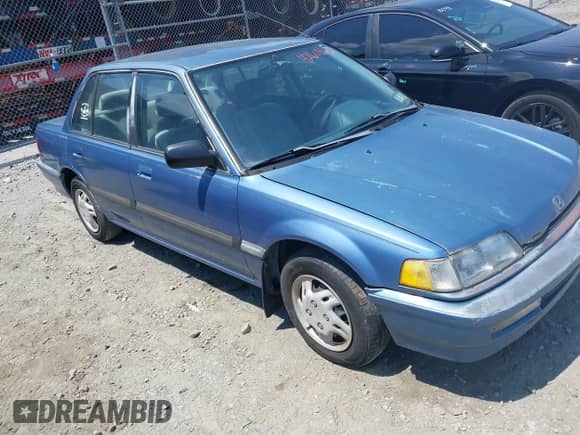1991 Honda Civic z VIN 1HGED3656ML043956, wystawiony jako IAAI lot #42608632 z przebiegiem 163 524 mil mil oraz . Historia ofert i sprzedaży dostępna na DreamBid. Obrazek 1.