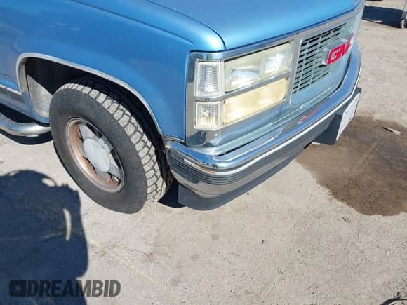 1996 GMC Sierra 1500 z VIN 2GTEC19M9T1527701, wystawiony jako IAAI lot #43289683 z przebiegiem 297 195 mil mil oraz . Historia ofert i sprzedaży dostępna na DreamBid. Obrazek 6.