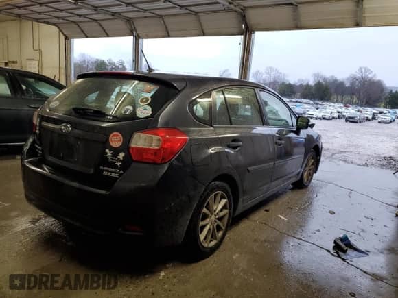 2014 Subaru Impreza Premium with VIN JF1GPAC67E8319894, listed as a Copart auction lot 86804674 with 175,107 mi miles and Salvage title. Bid and sale history available at DreamBid. Image 3.
