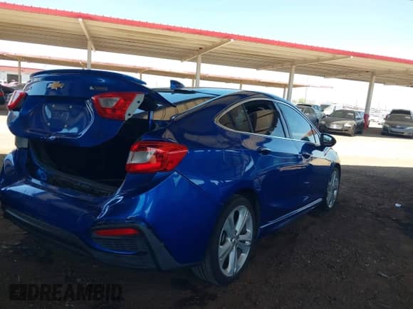2016 Chevrolet Cruze Premier z VIN 1G1BG5SM0G7324934, wystawiony jako IAAI lot #42690646 z przebiegiem 111 716 mil mil oraz . Historia ofert i sprzedaży dostępna na DreamBid. Obrazek 4.