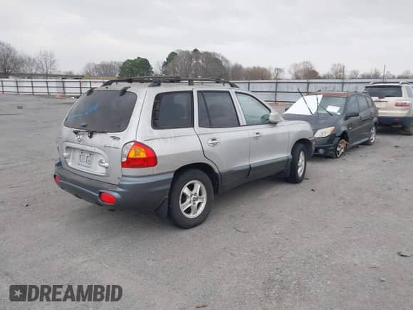 2001 Hyundai Santa Fe GLS с VIN KM8SC83D31U098346, выставлен на аукционе IAAI как лот 41798416 с пробегом 209 154 миль миль и . История ставок и продаж доступна на DreamBid. Изображение 4.