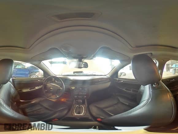 2012 Chevrolet Impala LTZ with VIN 2G1WC5E30C1221083, listed as a Copart auction lot 81643965 with 153,674 mi miles and Salvage title. Bid and sale history available at DreamBid. Image 14.