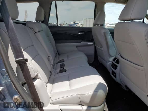 2020 Honda Pilot Touring 8-Passenger z VIN 5FNYF5H9XLB000448, wystawiony jako Copart lot #60402965 z przebiegiem 58 596 mil mil oraz Czysty tytuł • Clean title. Historia ofert i sprzedaży dostępna na DreamBid. Obrazek 11.