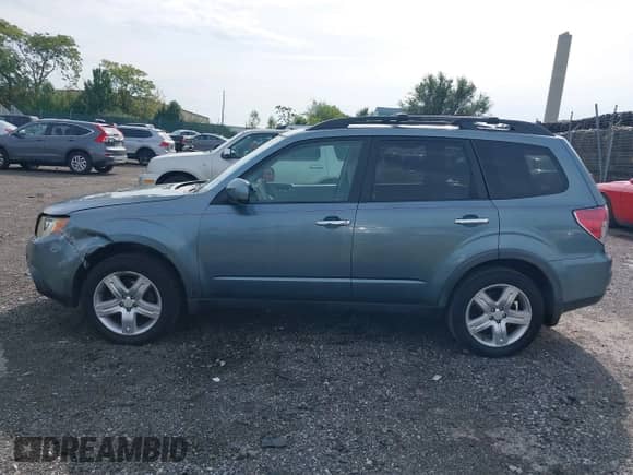 2009 Subaru Forester X with VIN JF2SH63629H771368, listed as a IAAI auction lot 43328472 with 139,584 mi miles and . Bid and sale history available at DreamBid. Image 14.