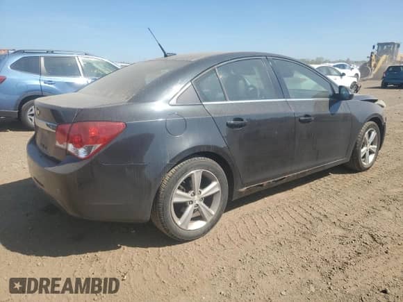 2014 Chevrolet Cruze 2LT z VIN 1G1PE5SB7E7134961, wystawiony jako Copart lot #80958165 z przebiegiem 154 313 mil mil oraz Szkoda całkowita • Salvage title. Historia ofert i sprzedaży dostępna na DreamBid. Obrazek 3.