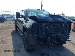 2018 Chevrolet Silverado 2500HD LT z VIN 1GC1KVEY3JF287701, wystawiony jako IAAI lot #42992874 z przebiegiem 146 945 mil mil oraz . Historia ofert i sprzedaży dostępna na DreamBid. Obrazek 1.