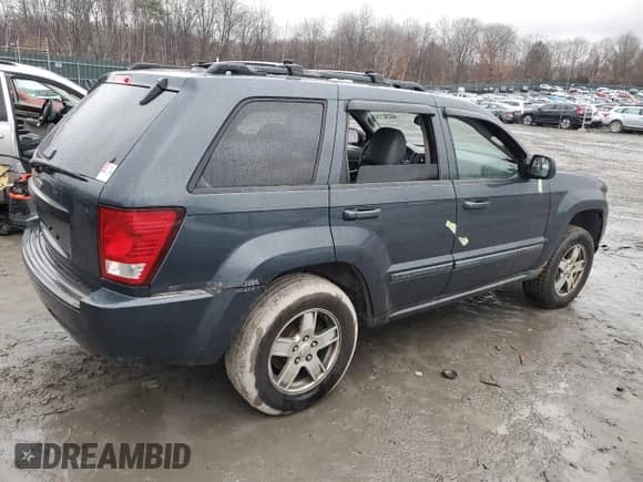 2007 Jeep Grand Cherokee Laredo с VIN 1J8GR48K57C646153, выставлен на аукционе Copart как лот 48402325 с пробегом 258 317 миль миль и Списание • Salvage title. История ставок и продаж доступна на DreamBid. Изображение 3.