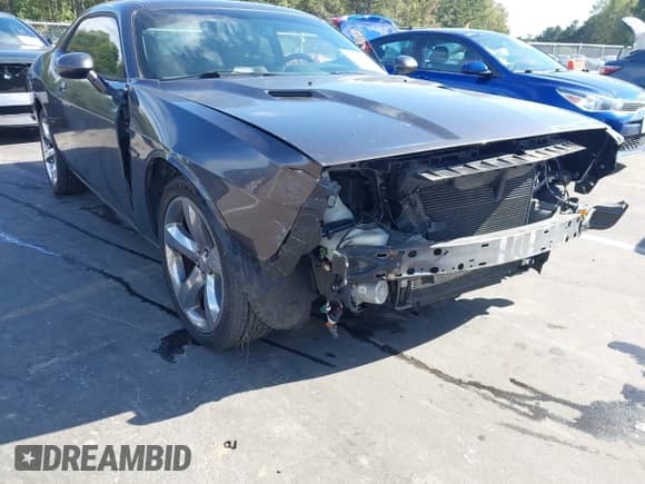 2013 Dodge Challenger SXT с VIN 2C3CDYAG0DH684162, выставлен на аукционе IAAI как лот 43399757 с пробегом 113 941 миль миль и . История ставок и продаж доступна на DreamBid. Изображение 6.