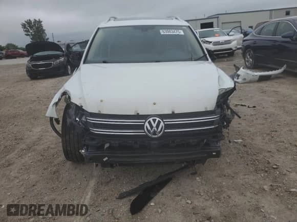 2016 Volkswagen Tiguan S с VIN WVGAV7AX7GW583485, выставлен на аукционе Copart как лот 63003475 с пробегом 108 230 миль миль и Списание • Salvage title. История ставок и продаж доступна на DreamBid. Изображение 5.