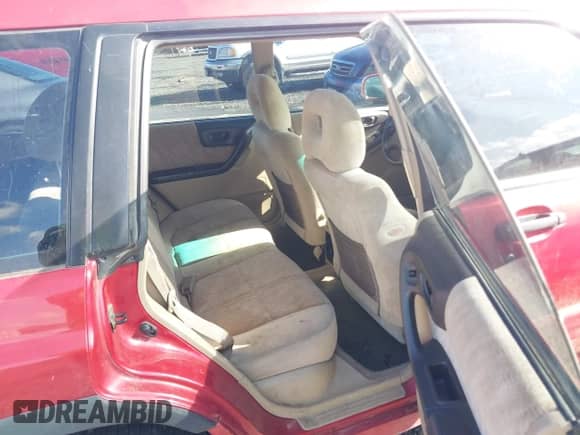 2002 Subaru Forester S with VIN JF1SF65662H713647, listed as a IAAI auction lot 43564108 with 236,560 mi miles and . Bid and sale history available at DreamBid. Image 8.