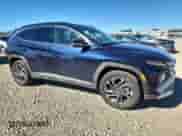 2025 Hyundai Tucson Limited with VIN KM8JEDD1XSU261174, listed as a Copart auction lot 90303745 with 19,622 mi miles and Salvage title. Bid and sale history available at DreamBid. Image 4.