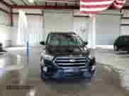 2018 Ford Escape SE with VIN 1FMCU9GD2JUC25153, listed as a Copart auction lot 87018485 with 104,172 mi miles and Salvage title. Bid and sale history available at DreamBid. Image 15.