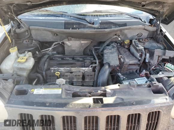 2010 Jeep Compass Sport z VIN 1J4NT1FB8AD671108, wystawiony jako Copart lot #82151454 z przebiegiem 206 413 mil mil oraz Szkoda całkowita • Salvage title. Historia ofert i sprzedaży dostępna na DreamBid. Obrazek 12.