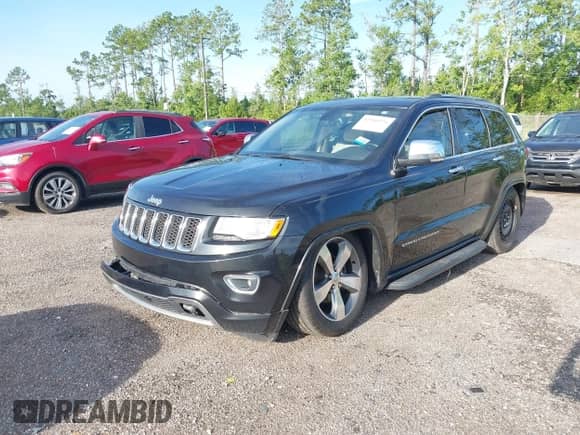 2015 Jeep Grand Cherokee High Altitude with VIN 1C4RJFCG3FC174006, listed as a IAAI auction lot 42900356 with 163,261 mi miles and . Bid and sale history available at DreamBid. Image 2.