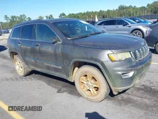 2017 Jeep Grand Cherokee Laredo with VIN 1C4RJEAG1HC845849, listed as a IAAI auction lot 43457425 with 106,162 mi miles and . Bid and sale history available at DreamBid. Image 1.