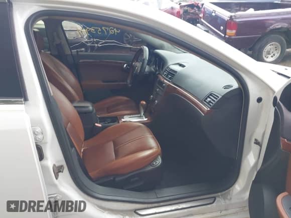 2009 Saturn Aura XR with VIN 1G8ZX57759F193852, listed as a IAAI auction lot 42753941 with 152,006 mi miles and . Bid and sale history available at DreamBid. Image 5.