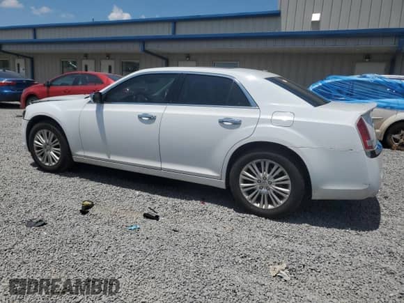 2012 Chrysler 300 Limited с VIN 2C3CCAHG2CH168075, выставлен на аукционе Copart как лот 62211135 с пробегом 163 235 миль миль и Списание • Salvage title. История ставок и продаж доступна на DreamBid. Изображение 2.
