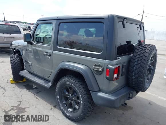 2022 Jeep Wrangler Sport S z VIN 1C4GJXAN2NW176325, wystawiony jako IAAI lot #42168112 z przebiegiem 18 004 mil mil oraz . Historia ofert i sprzedaży dostępna na DreamBid. Obrazek 3.
