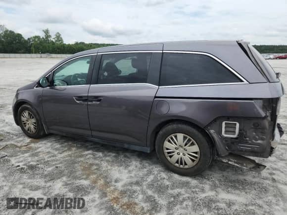 2015 Honda Odyssey LX with VIN 5FNRL5H24FB115888, listed as a Copart auction lot 68158785 with 139,233 mi miles and Salvage title. Bid and sale history available at DreamBid. Image 2.