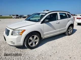 2010 Dodge Caliber SXT with VIN 1B3CB4HA2AD533460, listed as a Copart auction lot 71959205 with 159,235 mi miles and Salvage title. Bid and sale history available at DreamBid. Image 1.
