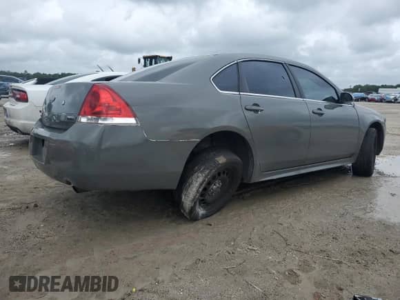 2012 Chevrolet Impala Police Police with VIN 2G1WD5E3XC1162170, listed as a Copart auction lot 70986324 with 148,208 mi miles and Salvage title. Bid and sale history available at DreamBid. Image 3.