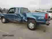 1992 GMC Sierra 1500 z VIN 2GTEK19K1N1537823, wystawiony jako Copart lot #74952004 z przebiegiem 147 810 mil mil oraz Szkoda całkowita • Salvage title. Historia ofert i sprzedaży dostępna na DreamBid. Obrazek 2.