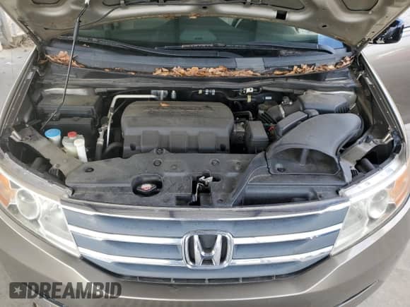 2012 Honda Odyssey EX с VIN 5FNRL5H45CB072689, выставлен на аукционе Copart как лот 82215635 с пробегом 197 302 миль миль и Списание • Salvage title. История ставок и продаж доступна на DreamBid. Изображение 11.