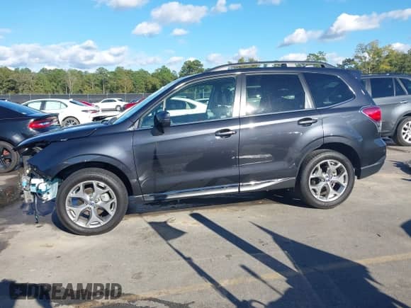 2018 Subaru Forester Touring z VIN JF2SJAWC6JH455890, wystawiony jako IAAI lot #43426177 z przebiegiem 44 143 mil mil oraz . Historia ofert i sprzedaży dostępna na DreamBid. Obrazek 15.