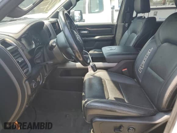 2021 Ram 1500 Rebel z VIN 1C6SRFLT6MN759226, wystawiony jako Copart lot #67418755 z przebiegiem 59 174 mil mil oraz Szkoda całkowita • Salvage title. Historia ofert i sprzedaży dostępna na DreamBid. Obrazek 7.