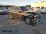 2000 Chevrolet Tahoe Limited with VIN 1GNEC13R5YR162329, listed as a Copart auction lot 84117434 with 177,241 mi miles and Salvage title. Bid and sale history available at DreamBid. Image 4.