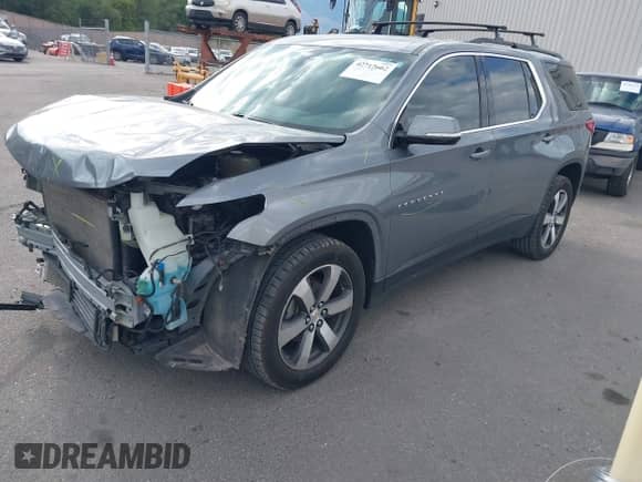 2019 Chevrolet Traverse LT z VIN 1GNEVHKW1KJ129618, wystawiony jako IAAI lot #42712662 z przebiegiem 144 058 mil mil oraz . Historia ofert i sprzedaży dostępna na DreamBid. Obrazek 17.
