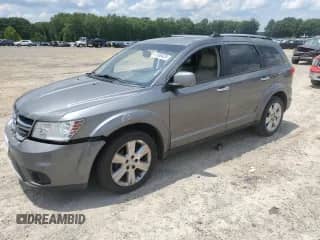 2012 Dodge Journey Crew with VIN 3C4PDCDG0CT159507, listed as a Copart auction lot 61588405 with 173,444 mi miles and Clean title. Bid and sale history available at DreamBid. Image 1.