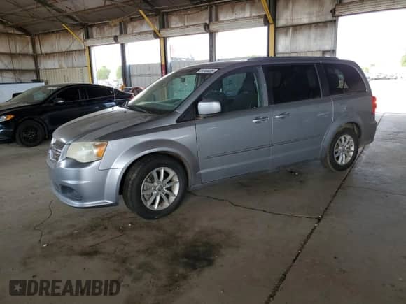 2014 Dodge Grand Caravan SXT with VIN 2C4RDGCG4ER184109, listed as a Copart auction lot 81249405 with 87,245 mi miles and Clean title. Bid and sale history available at DreamBid. Image 1.