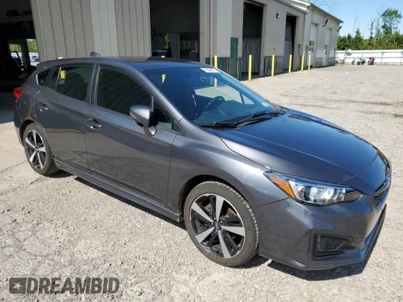 2019 Subaru Impreza Special Sports with VIN 4S3GTAJ67K3730035, listed as a Copart auction lot 70304575 with 71,728 mi miles and Salvage title. Bid and sale history available at DreamBid. Image 4.