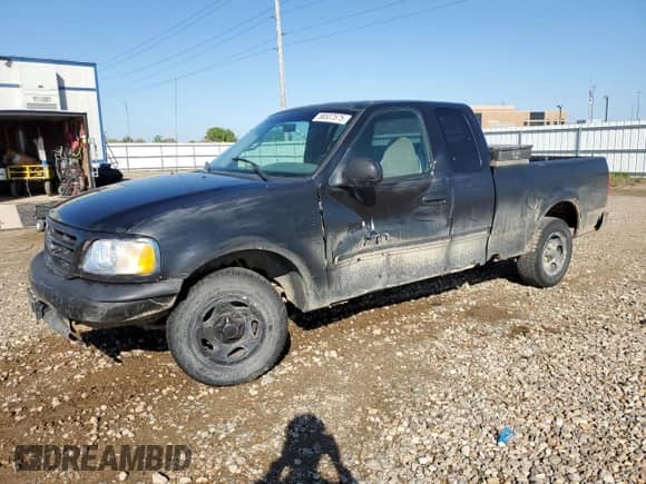 2000 Ford F-150 XL z VIN 1FTZX1729YNA19838, wystawiony jako Copart lot #58537575 z przebiegiem 254 403 mil mil oraz Czysty tytuł • Clean title. Historia ofert i sprzedaży dostępna na DreamBid. Obrazek 1.