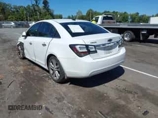 2013 Chevrolet Cruze LTZ z VIN 1G1PG5SB1D7225832, wystawiony jako IAAI lot #43171487 z przebiegiem 183 312 mil mil oraz . Historia ofert i sprzedaży dostępna na DreamBid. Obrazek 3.
