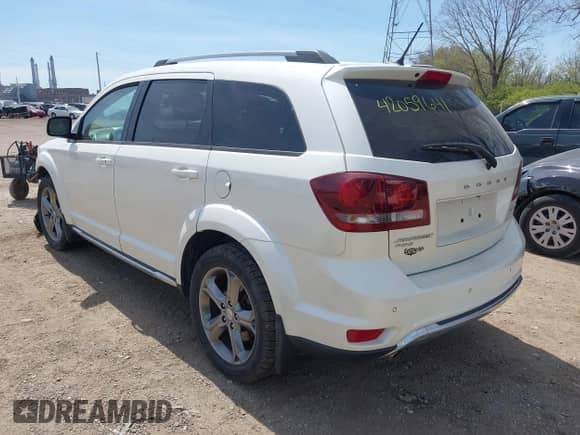 2017 Dodge Journey Crossroad Plus with VIN 3C4PDDGG0HT548477, listed as a IAAI auction lot 42059641 with 100,576 mi miles and . Bid and sale history available at DreamBid. Image 3.