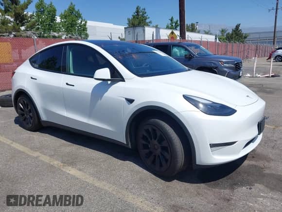 2022 Tesla Model Y Long Range z VIN 7SAYGDEE3NF545146, wystawiony jako IAAI lot #42724193 z przebiegiem Nie podano mil oraz . Historia ofert i sprzedaży dostępna na DreamBid. Obrazek 1.