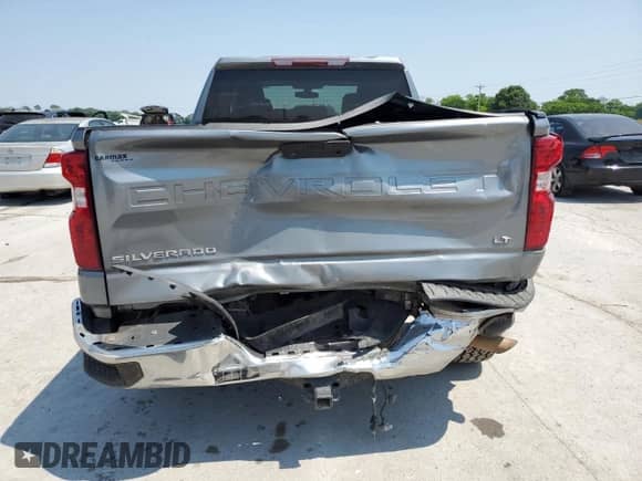 2019 Chevrolet Silverado 1500 LT with VIN 1GCRYDEK8KZ275647, listed as a Copart auction lot 58829495 with 124,577 mi miles and Salvage title. Bid and sale history available at DreamBid. Image 6.