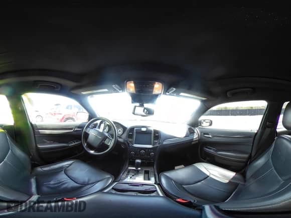 2013 Chrysler 300 C John Varvatos Limited Edition with VIN 2C3CCADT1DH744906, listed as a IAAI auction lot 42145934 with 136,872 mi miles and . Bid and sale history available at DreamBid. Image 19.