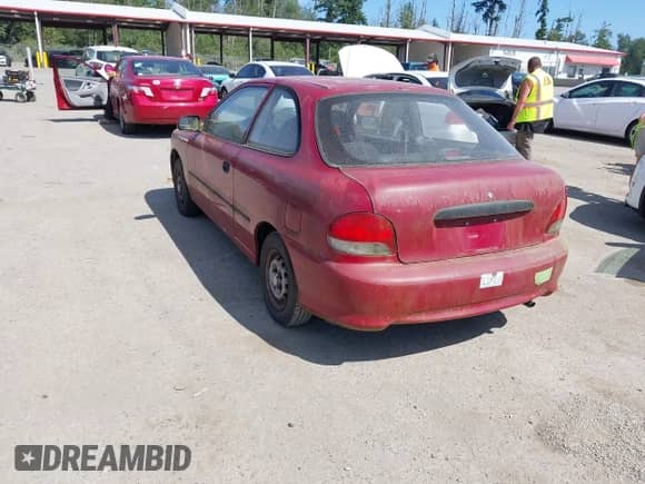 1998 Hyundai Accent z VIN KMHVD14N4WU370550, wystawiony jako IAAI lot #42433008 z przebiegiem 178 759 mil mil oraz . Historia ofert i sprzedaży dostępna na DreamBid. Obrazek 3.