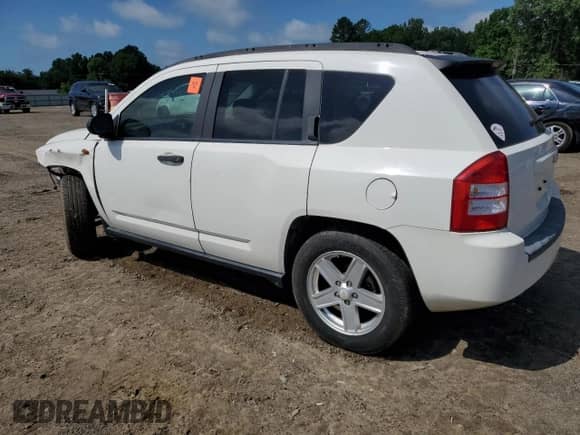 2007 Jeep Compass Sport with VIN 1J8FT47W07D107774, listed as a Copart auction lot 56740335 with 218,850 mi miles and Salvage title. Bid and sale history available at DreamBid. Image 2.