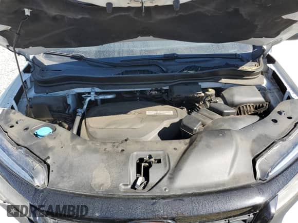 2020 Honda Passport Touring with VIN 5FNYF7H94LB003700, listed as a Copart auction lot 75535544 with Not provided miles and Salvage title. Bid and sale history available at DreamBid. Image 13.