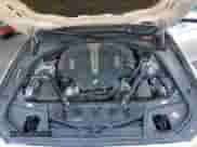 2014 BMW 5 Series 550i xDrive with VIN WBAKP9C55ED693077, listed as a Copart auction lot 64656535 with 107,416 mi miles and Salvage title. Bid and sale history available at DreamBid. Image 11.